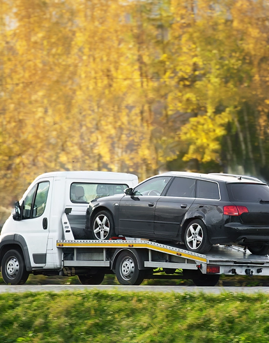 Car loaded onto a recovery truck
